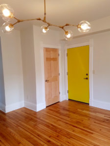 living room - closet + entry door